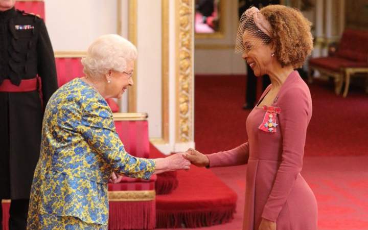 Sophie Okonedo receiving CBE from Her Majesty
